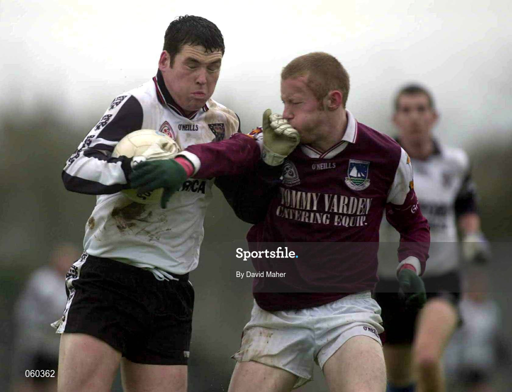21 April 2001; John McPartland of Sligo is tackled by Michael Comer of Galway during the Allianz GAA National Football League Division 1 Semi-Final match between Galway and Sligo in Dr Hyde Park in Roscommon. Photo by David Maher/Sportsfile