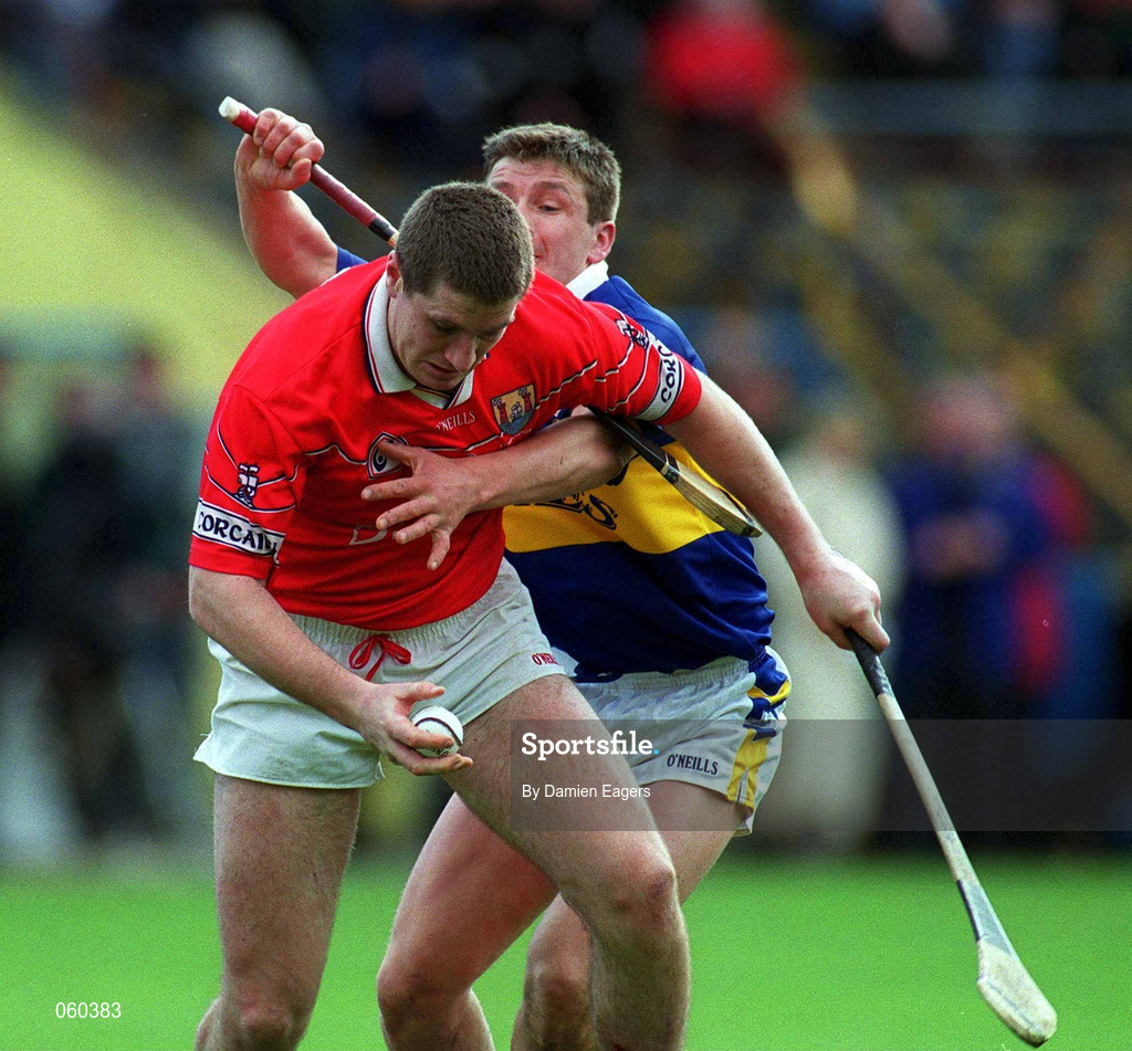 15 April 2001; Fergal McCormack of Cork is tackled by Noel Morris of Tipperary during the Allianz GAA National Hurling League Division 1B Round 5 match between Tipperary and Cork at Semple Stadium in Thurles, Tipperary. Photo by Damien Eagers/Sportsfile