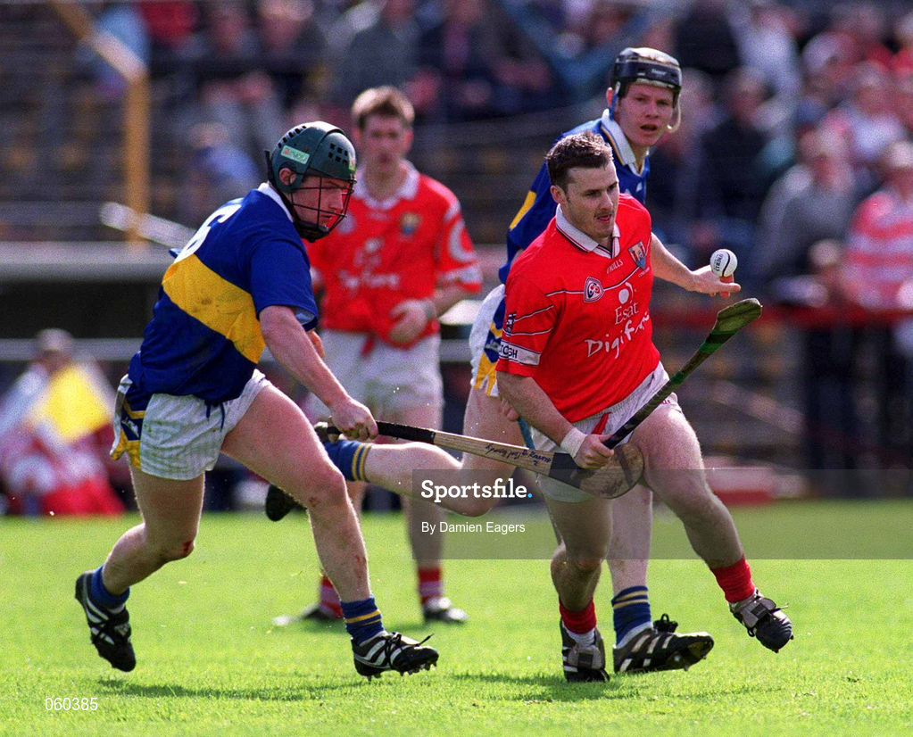 15 April 2001; Kevin Murray of Cork in action against David Kennedy of Tipperary during the Allianz GAA National Hurling League Division 1B Round 5 match between Tipperary and Cork at Semple Stadium in Thurles, Tipperary. Photo by Damien Eagers/Sportsfile