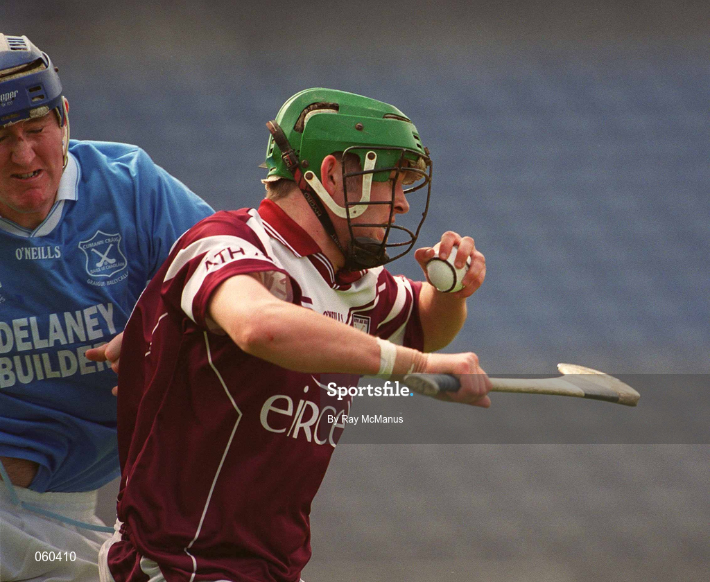 16 April 2001; Diarmuid Burns of Athenry gets away from Paddy O'Dwyer of Graigue Ballycallan during the AIB All-Ireland Senior Club Hurling Championship Final match between Athenry and Graigue Ballycallan at Croke Park in Dublin. Photo by Ray McManus/Sportsfile