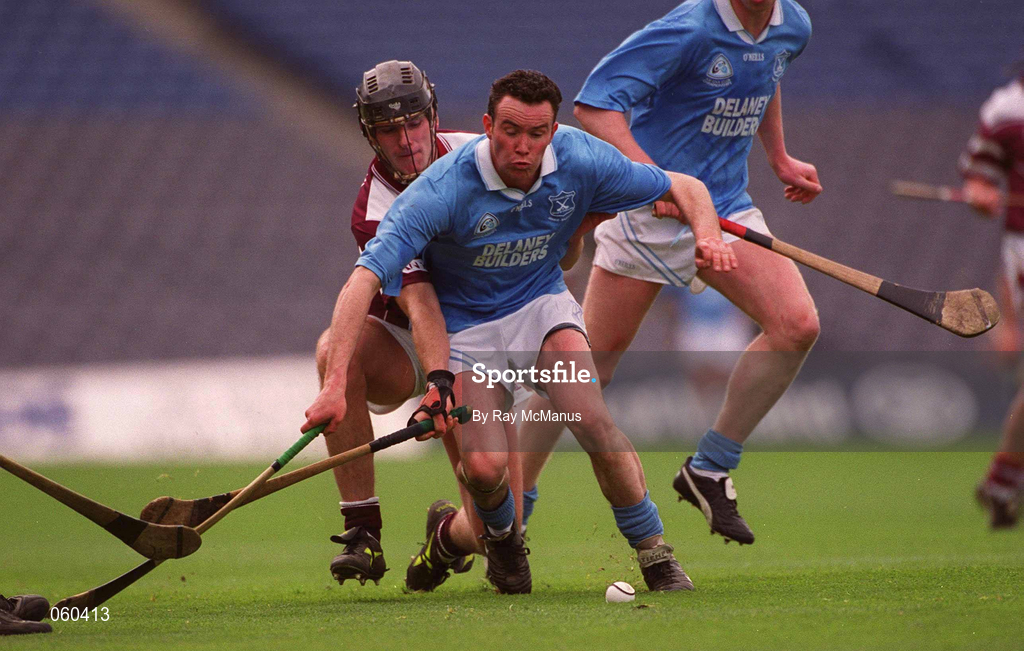 16 April 2001; Tomas Comerford of Graigue Ballycallan holds off the challenge of Joe Rabbitte of Athenry during the AIB All-Ireland Senior Club Hurling Championship Final match between Athenry and Graigue Ballycallan at Croke Park in Dublin. Photo by Ray McManus/Sportsfile