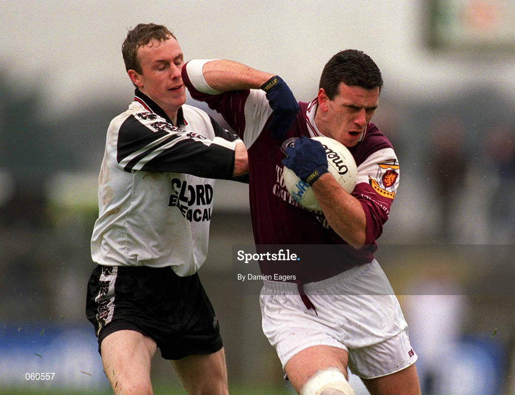21 April 2001; Padraic Joyce of Galway attempts to hold off the challenge of Padraig Doohan of Sligo during the Allianz GAA National Football League Division 1 Semi-Final match between Galway and Sligo in Dr Hyde Park in Roscommon. Photo by Damien Eagers/Sportsfile