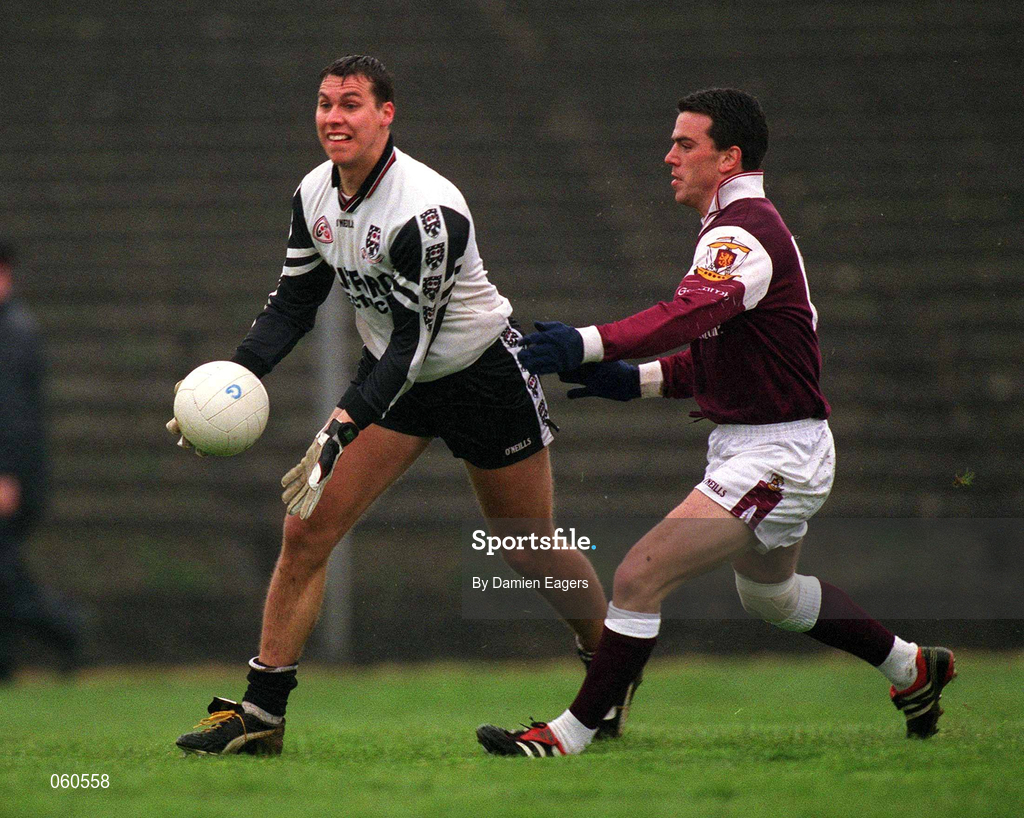 21 April 2001; Nigel Clancy of Sligo gets the ball away under pressure from Padraic Joyce of Galway during the Allianz GAA National Football League Division 1 Semi-Final match between Galway and Sligo in Dr Hyde Park in Roscommon. Photo by Damien Eagers/Sportsfile