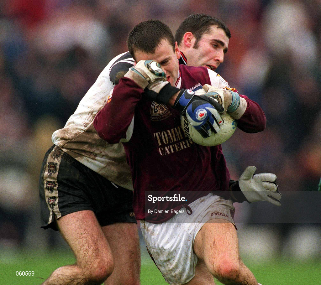 21 April 2001; Derek Savage of Galway is tackled by Brendan Phillips of Sligo during the Allianz GAA National Football League Division 1 Semi-Final match between Galway and Sligo in Dr Hyde Park in Roscommon. Photo by Damien Eagers/Sportsfile