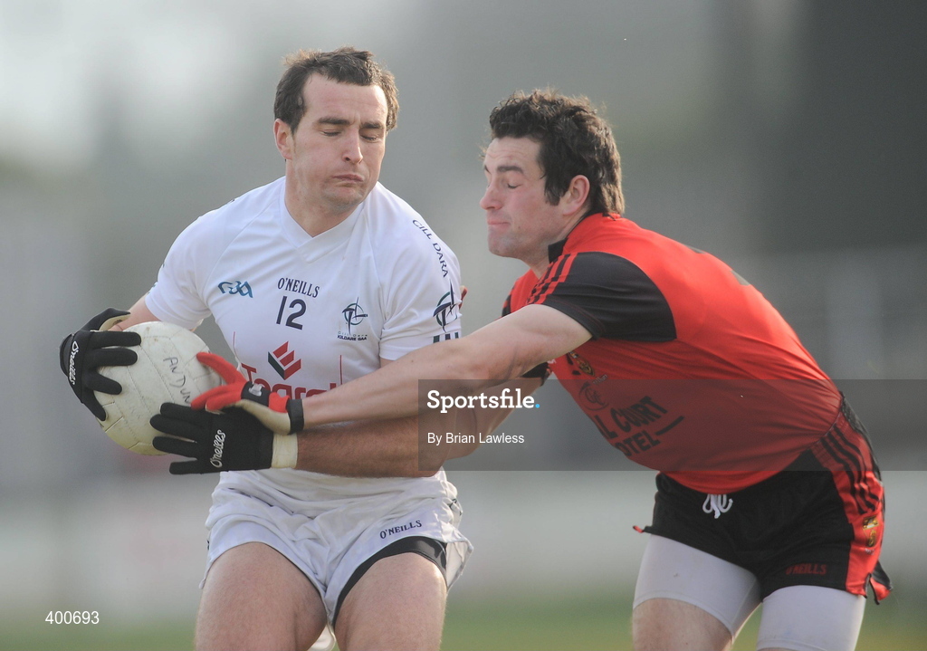 7 February 2010; Robert Kelly, Kildare, in action against Kevin McKernan, Down. Allianz GAA Football National League, Division 2, Round 1, Kildare v Down. St Conleth's Park, Newbridge, Co. Kildare. Picture credit: Brian Lawless / SPORTSFILE