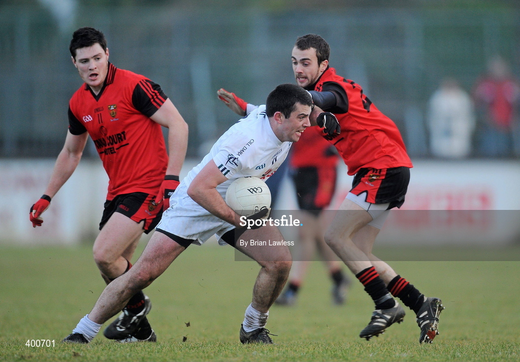 7 February 2010; Pádraig O'Neill, Kildare, in action against Conor Laverty and Martin Clarke, left, Down. Allianz GAA Football National League, Division 2, Round 1, Kildare v Down. St Conleth's Park, Newbridge, Co. Kildare. Picture credit: Brian Lawless / SPORTSFILE