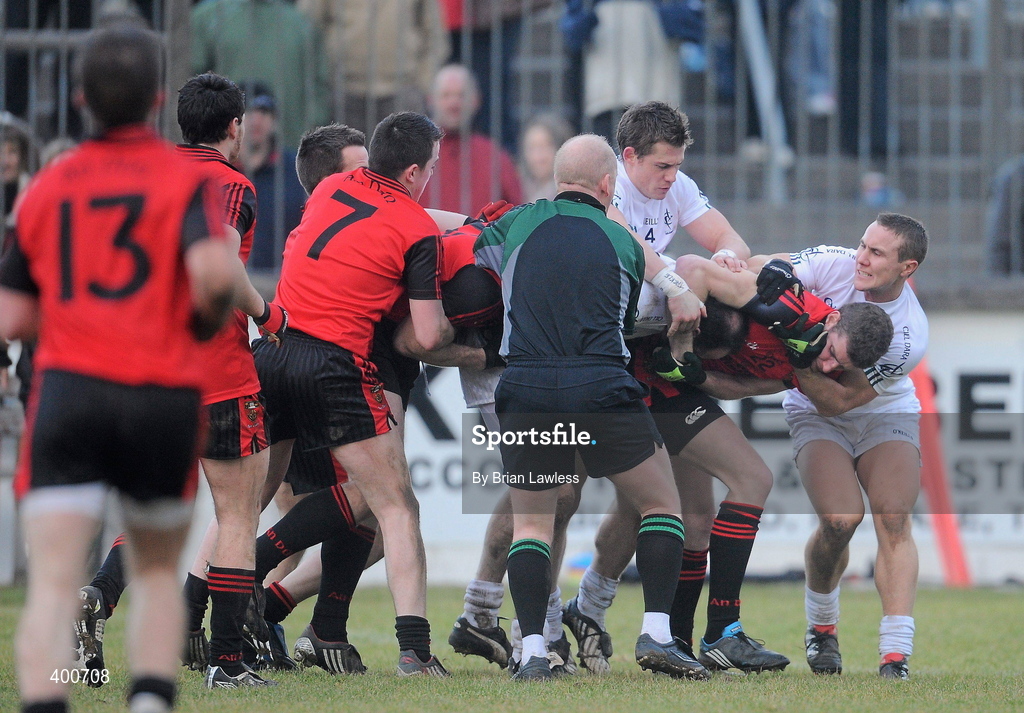 7 February 2010; Referee Derek Fahy attempts to seperate Kildare and Down players during the match. Allianz GAA Football National League, Division 2, Round 1, Kildare v Down. St Conleth's Park, Newbridge, Co. Kildare. Picture credit: Brian Lawless / SPORTSFILE