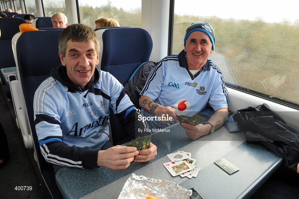 7 February 2010; Dublin supporters Donal Martin, left, and his brother Liam, from Finglas, playing cards on train to the game. Allianz GAA Football National League, Division 1, Round 1, Kerry v Dublin. Fitzgerald Stadium, Killarney. Picture credit: Ray McManus / SPORTSFILE