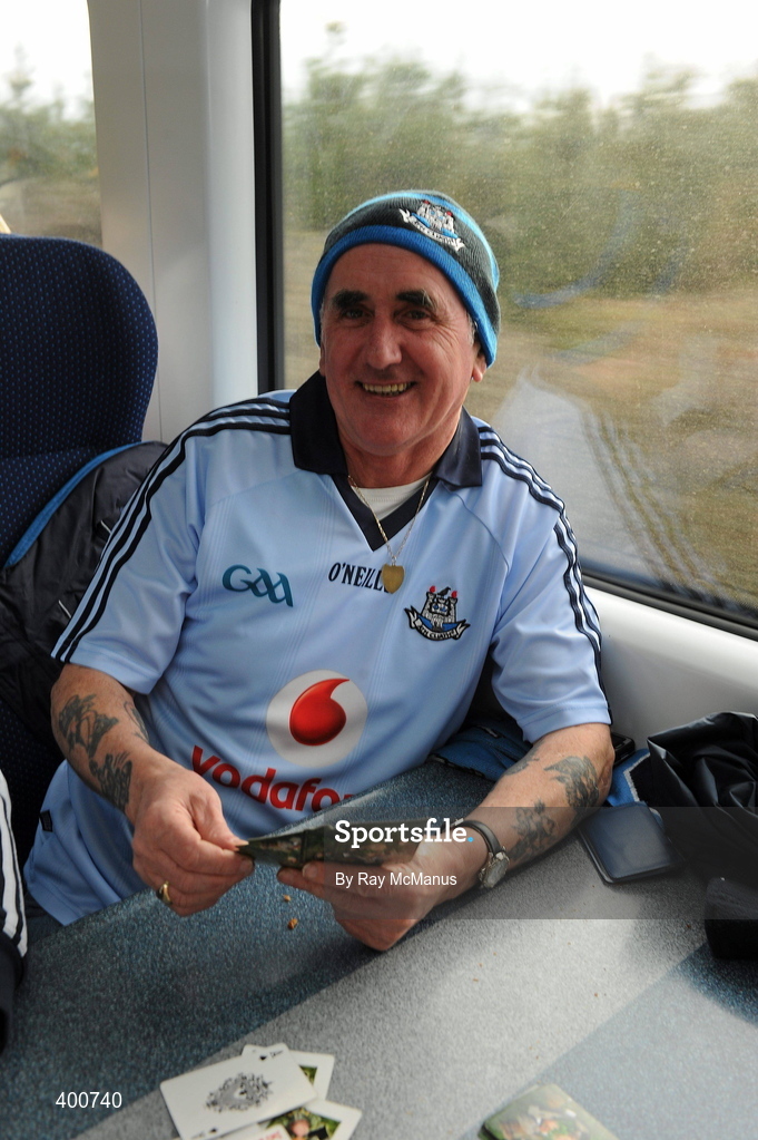 7 February 2010; Dublin supporter Liam Martin, from Finglas, playing cards on train to the game. Allianz GAA Football National League, Division 1, Round 1, Kerry v Dublin. Fitzgerald Stadium, Killarney. Picture credit: Ray McManus / SPORTSFILE
