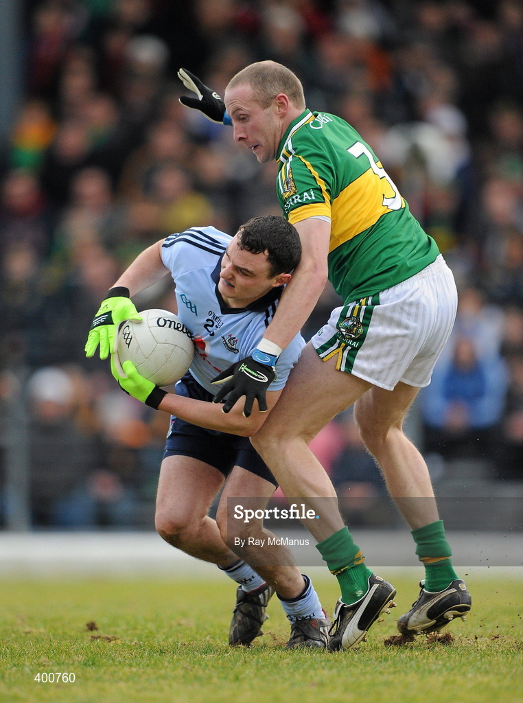 7 February 2010; Blaine Kelly, Dublin, is tackled by Kerry full-back Tommy Griffin. Allianz GAA Football National League, Division 1, Round 1, Kerry v Dublin. Fitzgerald Stadium, Killarney. Picture credit: Ray McManus / SPORTSFILE