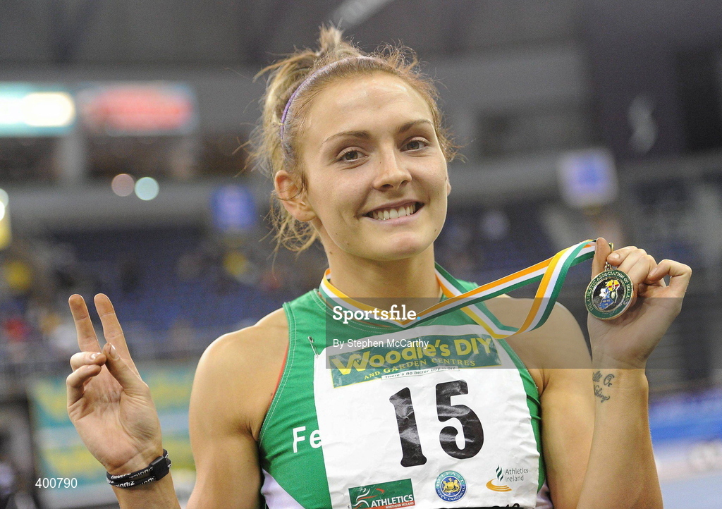 6 February 2010; Kelly Proper, Ferrybank A.C., celebrates with her medal for winning the Senior Women's 200m Final, following her victory in the Senior Women's Long Jump yesturday, during the second day of the Woodie’s DIY Senior Indoor Championships. Odyssey Arena, Belfast, Co. Antrim. Picture credit: Stephen McCarthy / SPORTSFILE