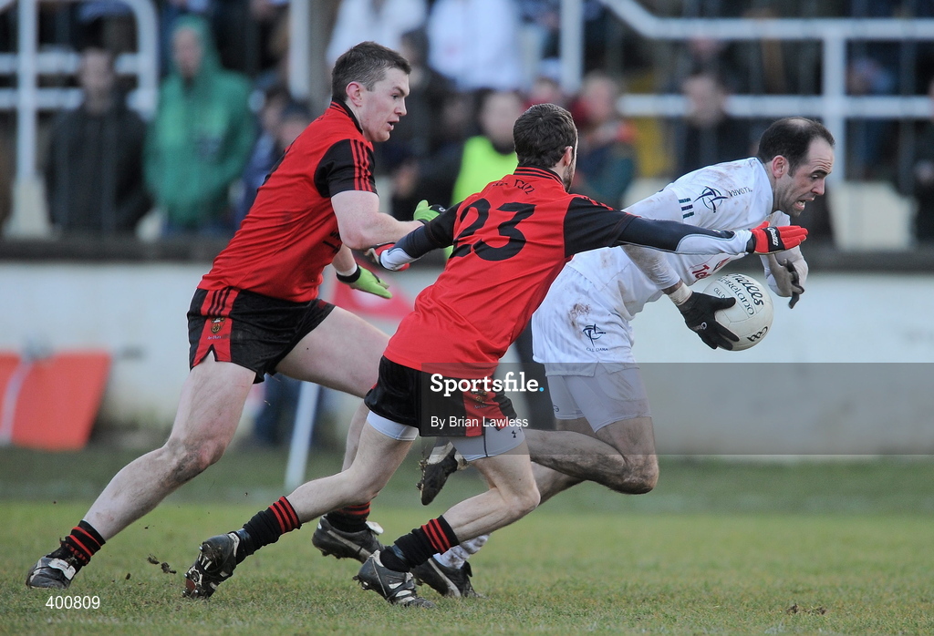 7 February 2010; Dermot Earley, Kildare, in action against Kalum King, left, and Conor Laverty, Down. Allianz GAA Football National League, Division 2, Round 1, Kildare v Down. St Conleth's Park, Newbridge, Co. Kildare. Picture credit: Brian Lawless / SPORTSFILE