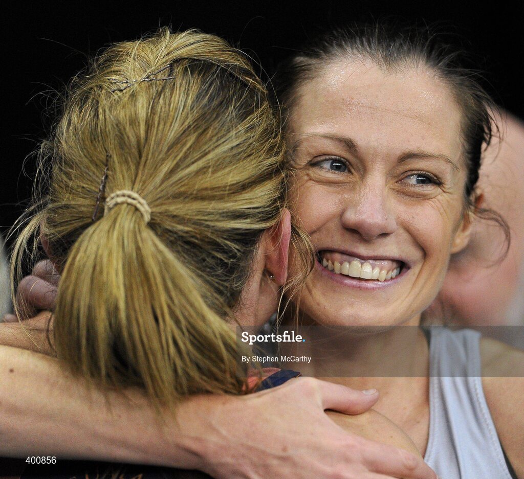6 February 2010; Kelly McNiece, City of Lisburn A.C., right, who won in a time of 4.14.63, is congratulated by Deirdre Byrne, Sli Cualann A.C., who finished in a time of 4.15.81, after the Senior Women's 1500m Final at the second day of the Woodie’s DIY Senior Indoor Championships. Odyssey Arena, Belfast, Co. Antrim. Picture credit: Stephen McCarthy / SPORTSFILE