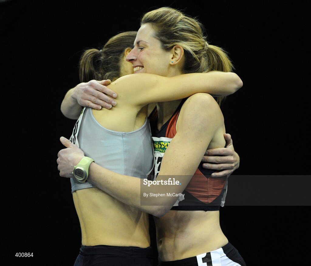 6 February 2010; Kelly McNiece, City of Lisburn A.C., left, who won in a time of 4.14.63, is congratulated by Deirdre Byrne, Sli Cualann A.C., who finished in a time of 4.15.81, after the Senior Women's 1500m Final at the second day of the Woodie’s DIY Senior Indoor Championships. Odyssey Arena, Belfast, Co. Antrim. Picture credit: Stephen McCarthy / SPORTSFILE