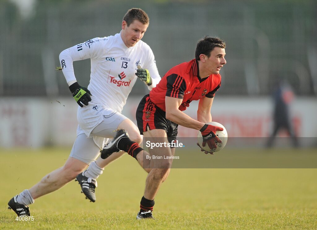 7 February 2010; Daniel Hughes, Down, in action against Karl Ennis, Kildare. Allianz GAA Football National League, Division 2, Round 1, Kildare v Down. St Conleth's Park, Newbridge, Co. Kildare. Picture credit: Brian Lawless / SPORTSFILE