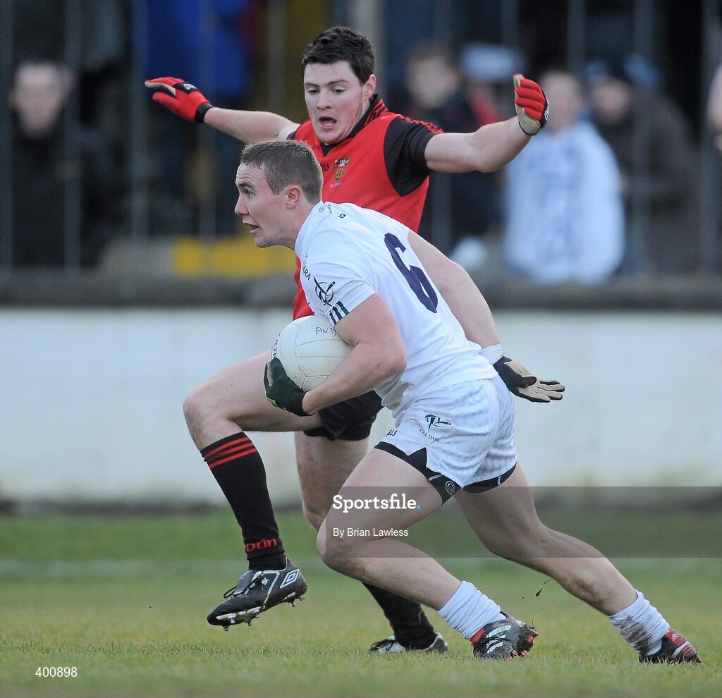 7 February 2010; Brian Flanagan, Kildare, in action against Martin Clarke, Down. Allianz GAA Football National League, Division 2, Round 1, Kildare v Down. St Conleth's Park, Newbridge, Co. Kildare. Picture credit: Brian Lawless / SPORTSFILE
