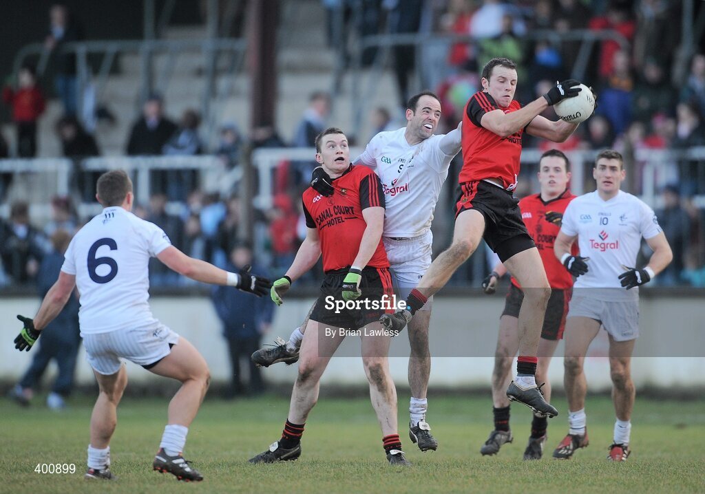 7 February 2010; Ambrose Rodgers, right, and Kalum King, Down, in action against Dermot Earley and Brian Flanagan, left, Kildare. Allianz GAA Football National League, Division 2, Round 1, Kildare v Down. St Conleth's Park, Newbridge, Co. Kildare. Picture credit: Brian Lawless / SPORTSFILE