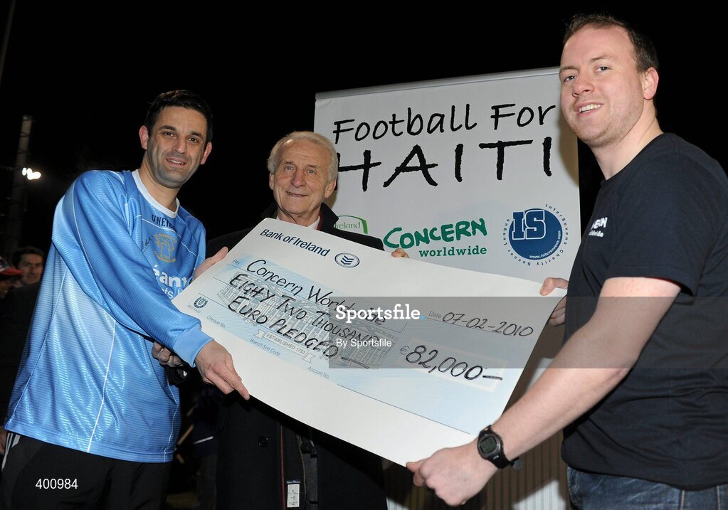 8 February 2010; Emmet Switzer, Inter Sevens League manager, left, Jonathon Power, right, Community Fundraising manager Concern Worldwide, right, and Republic of Ireland manager Giovanni Trapattoni with a cheque for 82,000 raised for Concern Worldwide from charity football games in aid of the Haiti Appeal. Charity Football Game in aid of the Haiti Appeal, Irishtown Stadium, Ringsend, Dublin. Photo by Sportsfile