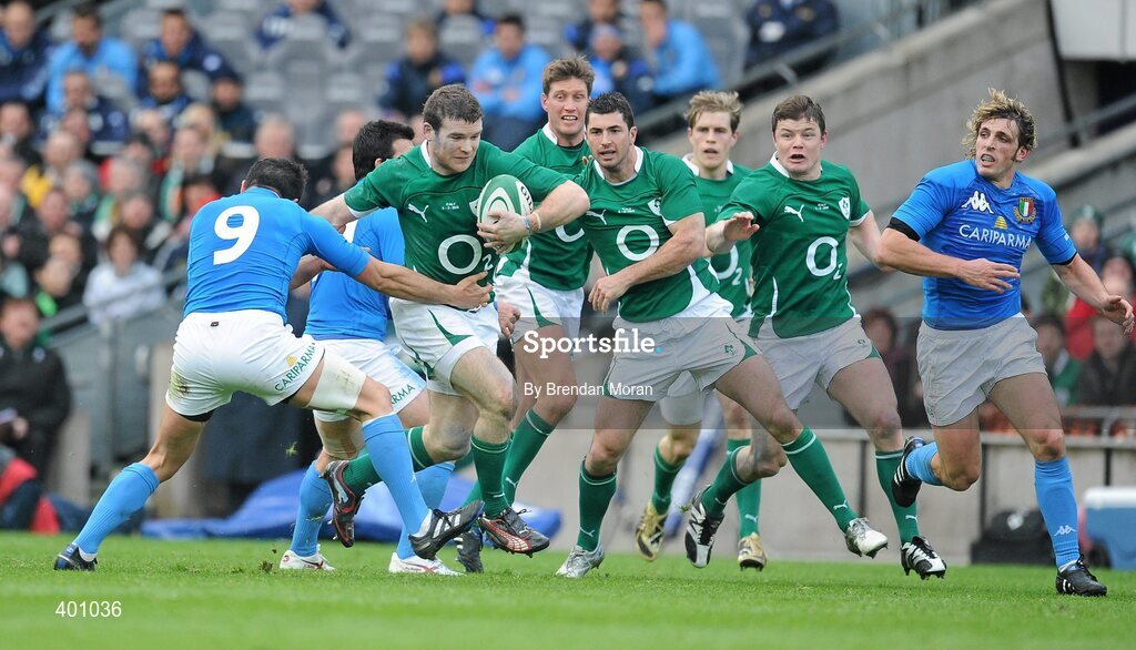 6 February 2010; Gordon D'Arcy, Ireland, supported by team-mates Ronan O'Gara, Rob Kearney, Andrew Trimble and Brian O'Driscoll, holds off the tackle of Tito Tebaldi, Italy. RBS Six Nations Rugby Championship, Ireland v Italy, Croke Park, Dublin. Picture credit: Brendan Moran / SPORTSFILE