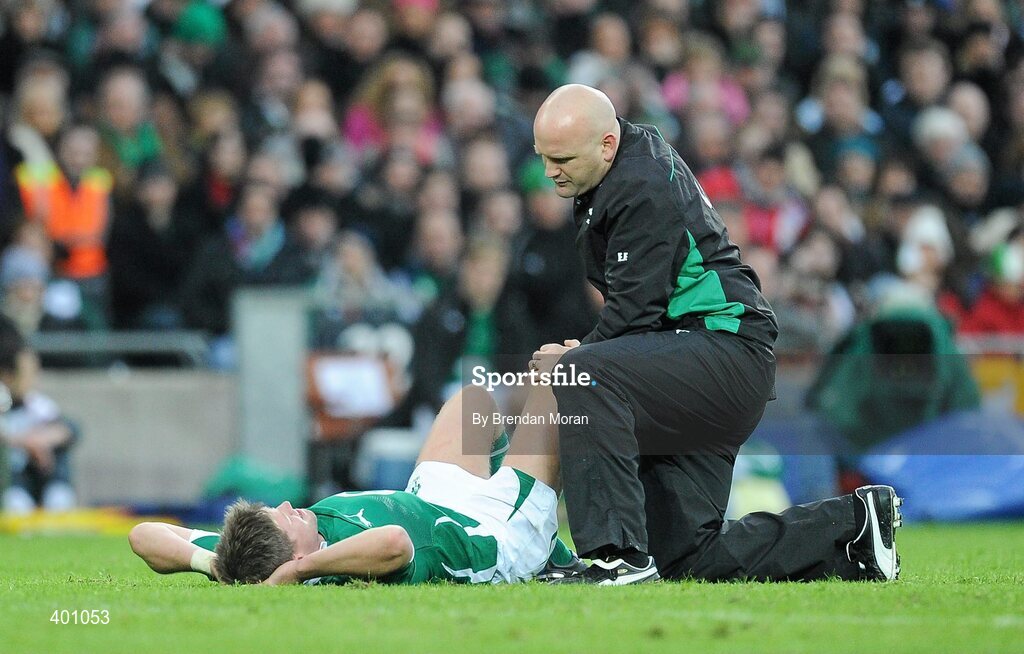 6 February 2010; Ronan O'Gara, Ireland, is attended to by team doctor Dr. Eanna Falvey. RBS Six Nations Rugby Championship, Ireland v Italy, Croke Park, Dublin. Picture credit: Brendan Moran / SPORTSFILE