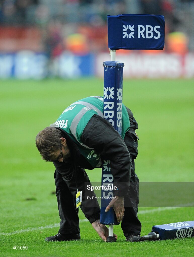 6 February 2010; Chief Groundsman at Croke Park Robert Ellis collects the sideline flags from the pitch after the game. RBS Six Nations Rugby Championship, Ireland v Italy, Croke Park, Dublin. Picture credit: Brendan Moran / SPORTSFILE
