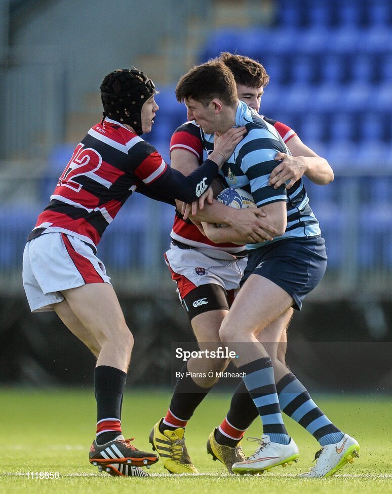 2 March 2016; Seán Gibbons, Castleknock College, is tackled by Adam Curry and William Hayden, left, Wesley College. Bank of Ireland Vinnie Murray Cup Final, Castleknock College v Wesley College, Donnybrook Stadium, Donnybrook, Dublin. Picture credit: Piaras Ó Mídheach / SPORTSFILE