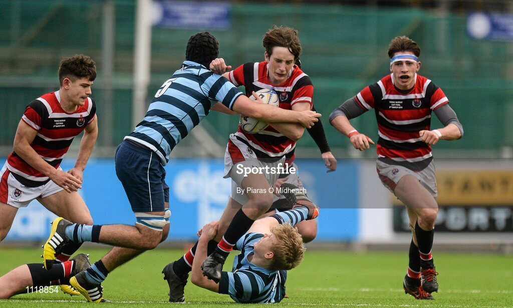 2 March 2016; Bill Corrigan, Wesley College, is tackled by Conor Stinson, left, and Adam Corcoran, Castleknock College. Bank of Ireland Vinnie Murray Cup Final, Castleknock College v Wesley College, Donnybrook Stadium, Donnybrook, Dublin. Picture credit: Piaras Ó Mídheach / SPORTSFILE