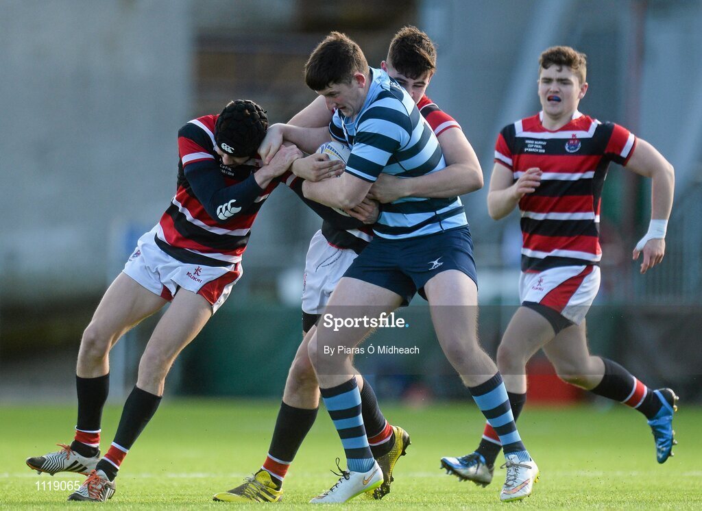 2 March 2016; Seán Gibbons, Castleknock College, is tackled by Adam Curry and William Hayden, left, Wesley College. Bank of Ireland Vinnie Murray Cup Final, Castleknock College v Wesley College, Donnybrook Stadium, Donnybrook, Dublin. Picture credit: Piaras Ó Mídheach / SPORTSFILE