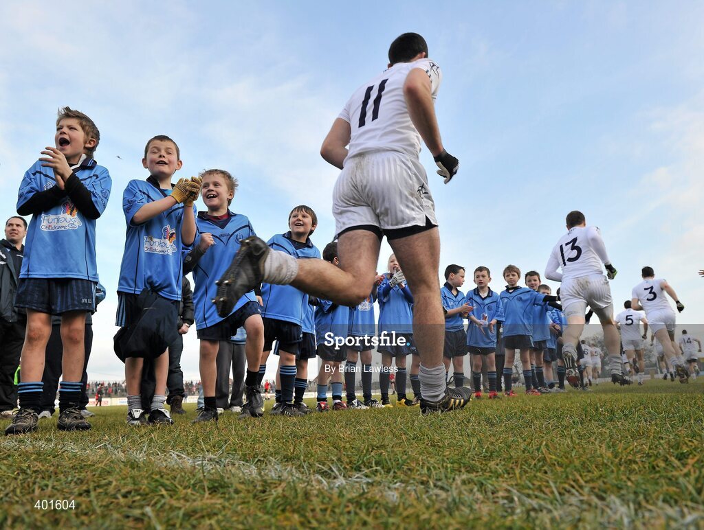 7 February 2010; Young members of Eadestown GFC, Kildare, cheer on the Kildare players as they make their way out for the start of the match. St Conleth's Park, Newbridge, Co. Kildare. Picture credit: Brian Lawless / SPORTSFILE