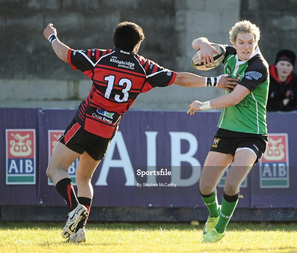 30 January 2010; Rudi Moore, City of Derry, in action against Leigh Manu, Armagh. AIB Junior Cup Final, Armagh v City of Derry, Dubarry Park, Athlone, Co. Westmeath. Picture credit: Stephen McCarthy / SPORTSFILE *** Local Caption ***