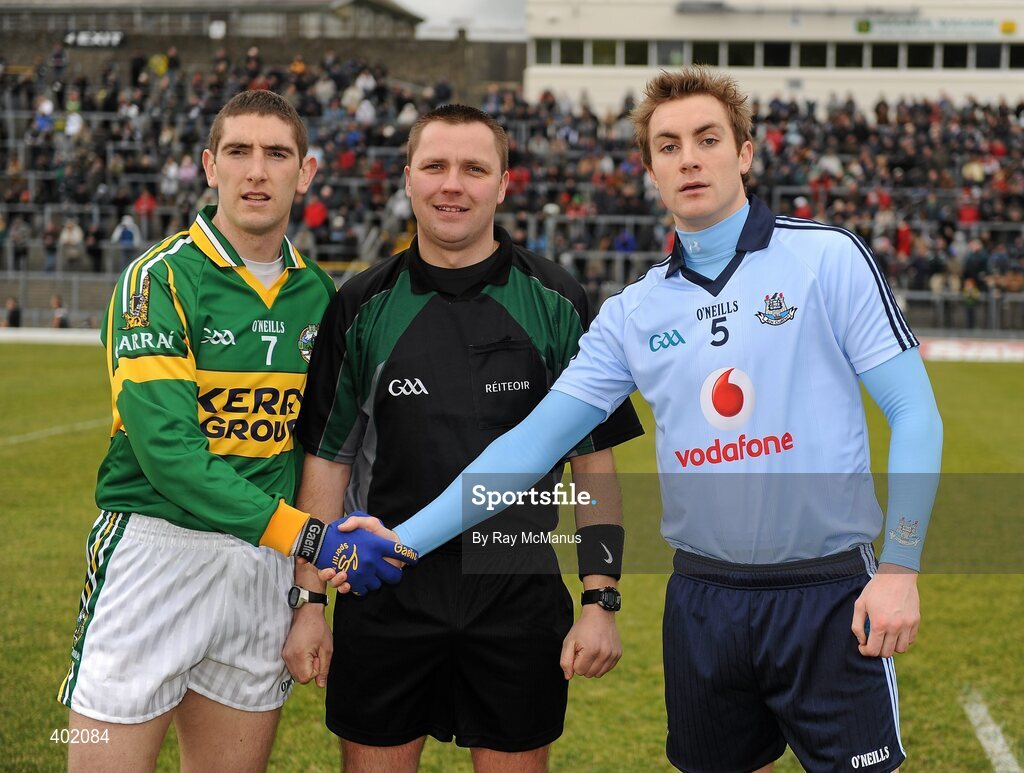 7 February 2010; The Kerry, Killian Young, and Dublin captains, Paul Griffin, great each other in the presence of match referee Rory Hickey before the game. Allianz GAA Football National League, Division 1, Round 1, Kerry v Dublin. Fitzgerald Stadium, Killarney. Picture credit: Ray McManus / SPORTSFILE