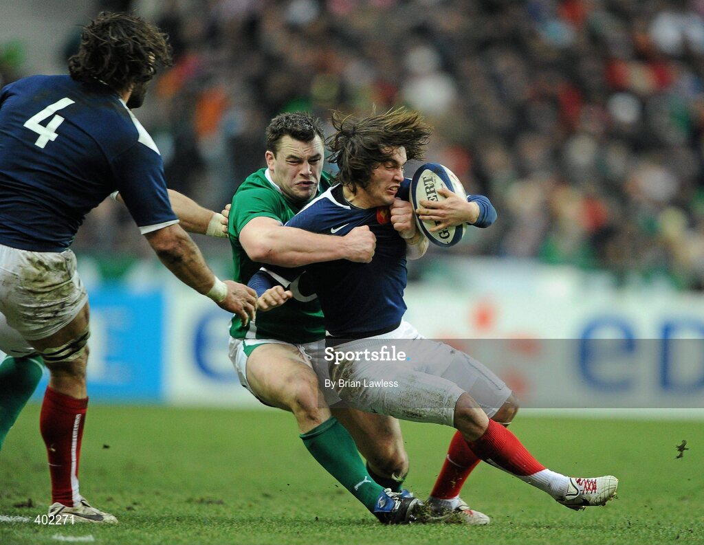 13 February 2010; Allexis Palisson, France, is tackled by Cian Healy, Ireland. RBS Six Nations Rugby Championship, France v Ireland, Stade de France, Saint Denis, Paris, France. Picture credit: Brian Lawless / SPORTSFILE