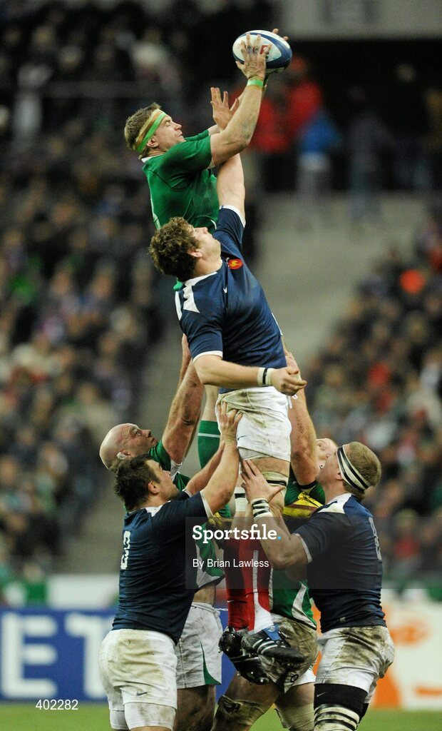 13 February 2010; Jamie Heaslip, Ireland, takes the ball in a lineout ahead of Pascal Pape, France. RBS Six Nations Rugby Championship, France v Ireland, Stade de France, Saint Denis, Paris, France. Picture credit: Brian Lawless / SPORTSFILE