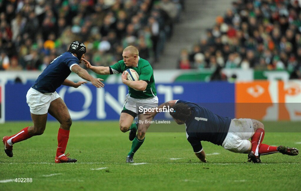 13 February 2010; Keith Earls, Ireland, is tackled by Thomas Domingo, right, and theirry Dusautoir, France. RBS Six Nations Rugby Championship, France v Ireland, Stade de France, Saint Denis, Paris, France. Picture credit: Brian Lawless / SPORTSFILE