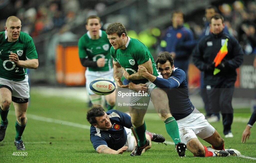 13 February 2010; Gordon D'Arcy, Ireland, loses possession after being tackled by David Marty, France. RBS Six Nations Rugby Championship, France v Ireland, Stade de France, Saint Denis, Paris, France. Picture credit: Brendan Moran / SPORTSFILE