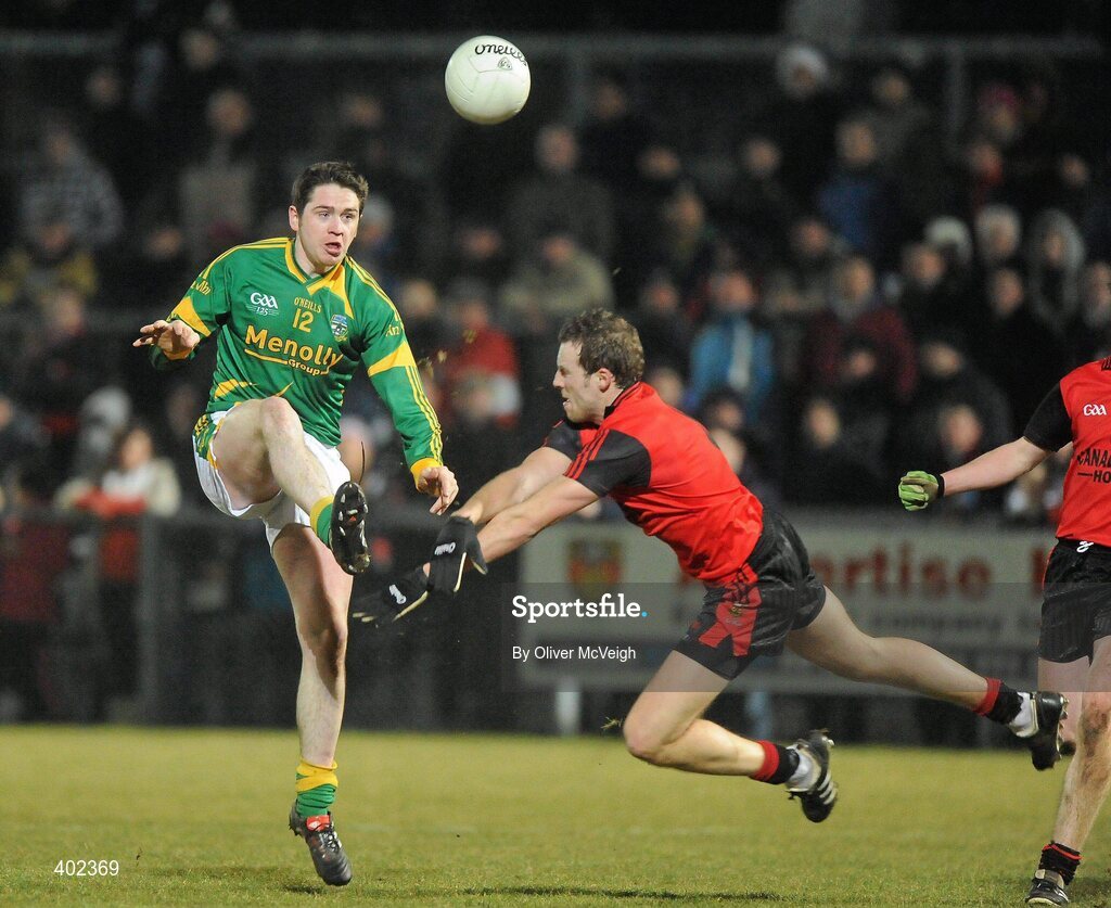 13 February 2010; Peadar Byrne, Meath, blocked down by Ambrose Rodgers, Down. Allianz National Football League, Division 2, Round 2, Down v Meath, Pairc Esler, Newry, Co. Down. Picture credit: Oliver McVeigh / SPORTSFILE