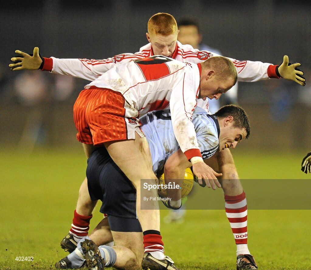 13 February 2010; Ross McConnell, Dublin, in action against Patsy Bradley and Seamus Bradley, back, Derry. Allianz National Football League, Division 1, Round 2, Dublin v Derry, Parnell Park, Dublin. Picture credit: Pat Murphy / SPORTSFILE