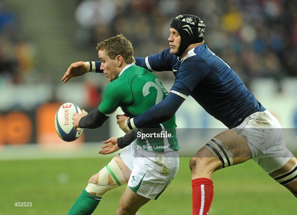 13 February 2010; Eoin Reddan, Ireland, is tackled by Julien Bonnaire, France. RBS Six Nations Rugby Championship, France v Ireland, Stade de France, Saint Denis, Paris, France. Picture credit: Brian Lawless / SPORTSFILE *** Local Caption ***