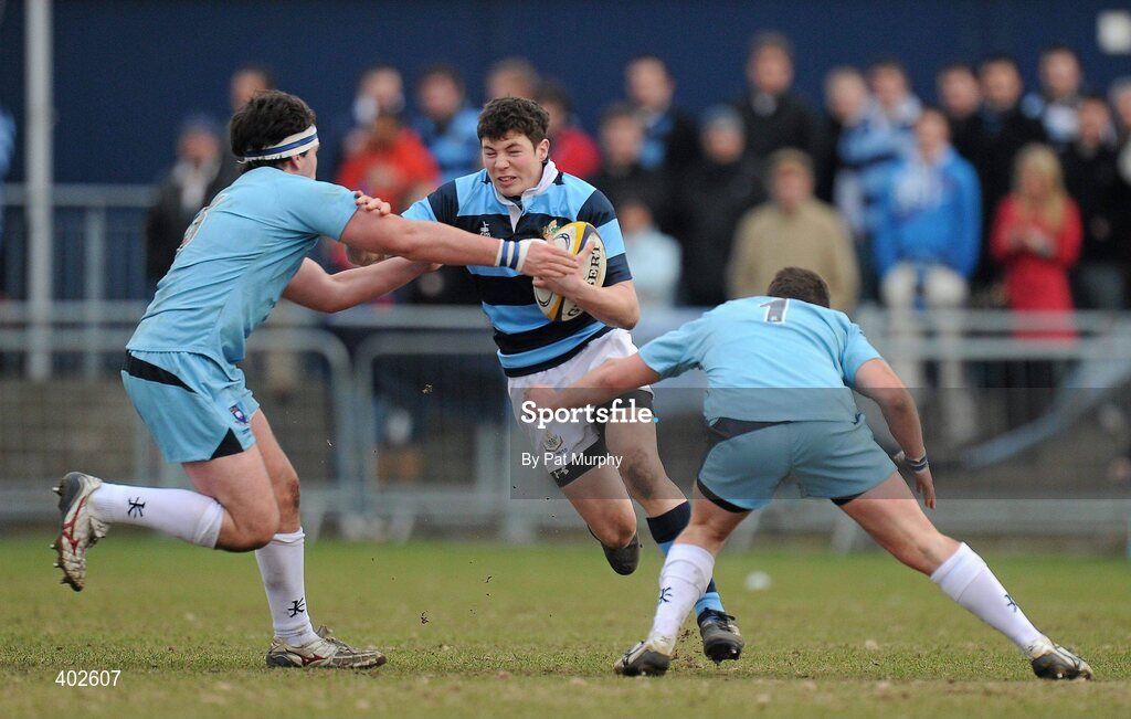 14 February 2010; Ross Jones, Castleknock College, is tackled by David Reynolds, left, and Aidan Noonan, St. Michael's College. Leinster Schools Senior Cup Quarter-Final, St. Michael's College v Castleknock College, Donnybrook Stadium, Donnybrook, Dublin. Picture credit: Pat Murphy / SPORTSFILE