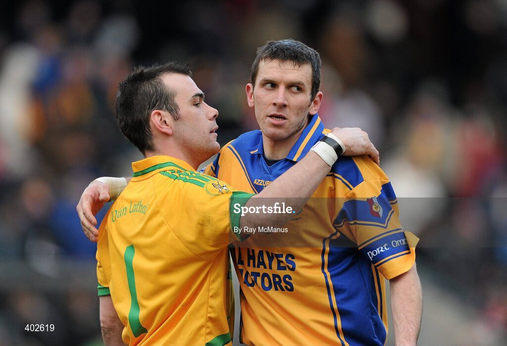 14 February 2010; Ciarán Ryan, Portumna, embraces Dunloy Cuchullians' goalkeeper Gareth McGhee after the game. AIB GAA Hurling All-Ireland Senior Club Championship Semi-Final, Portumna v Dunloy Cuchullians, Parnell Park, Dublin. Picture credit: Ray McManus / SPORTSFILE