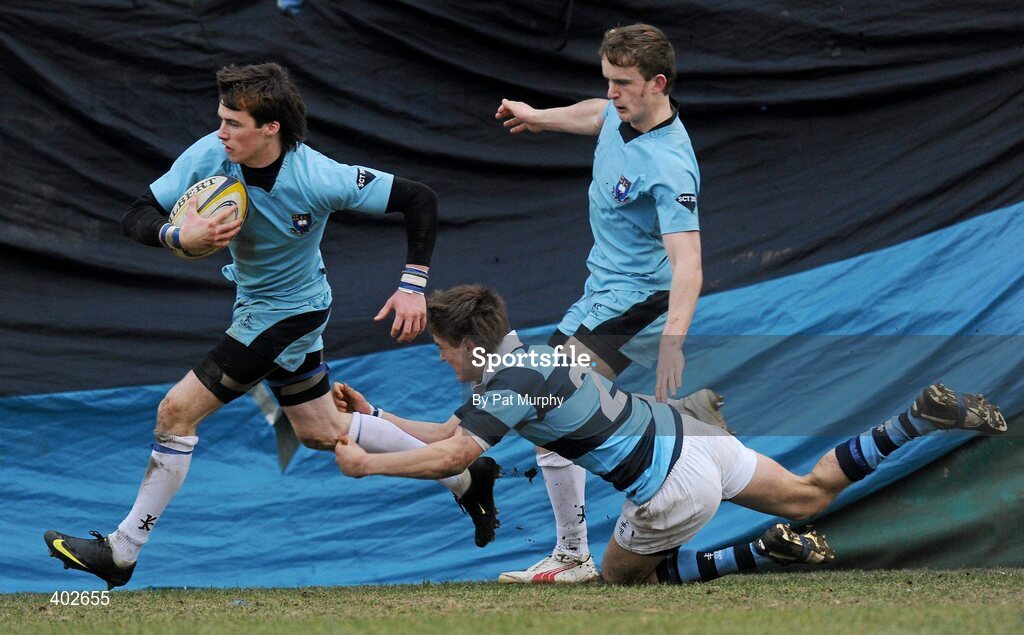 14 February 2010; Cormac Diamond, St. Michael's College, goes past the challenge of Fergus Toolan, Castleknock College, to score a late try for his team. Leinster Schools Senior Cup Quarter-Final, St. Michael's College v Castleknock College, v, Donnybrook Stadium, Donnybrook, Dublin. Picture credit: Pat Murphy / SPORTSFILE