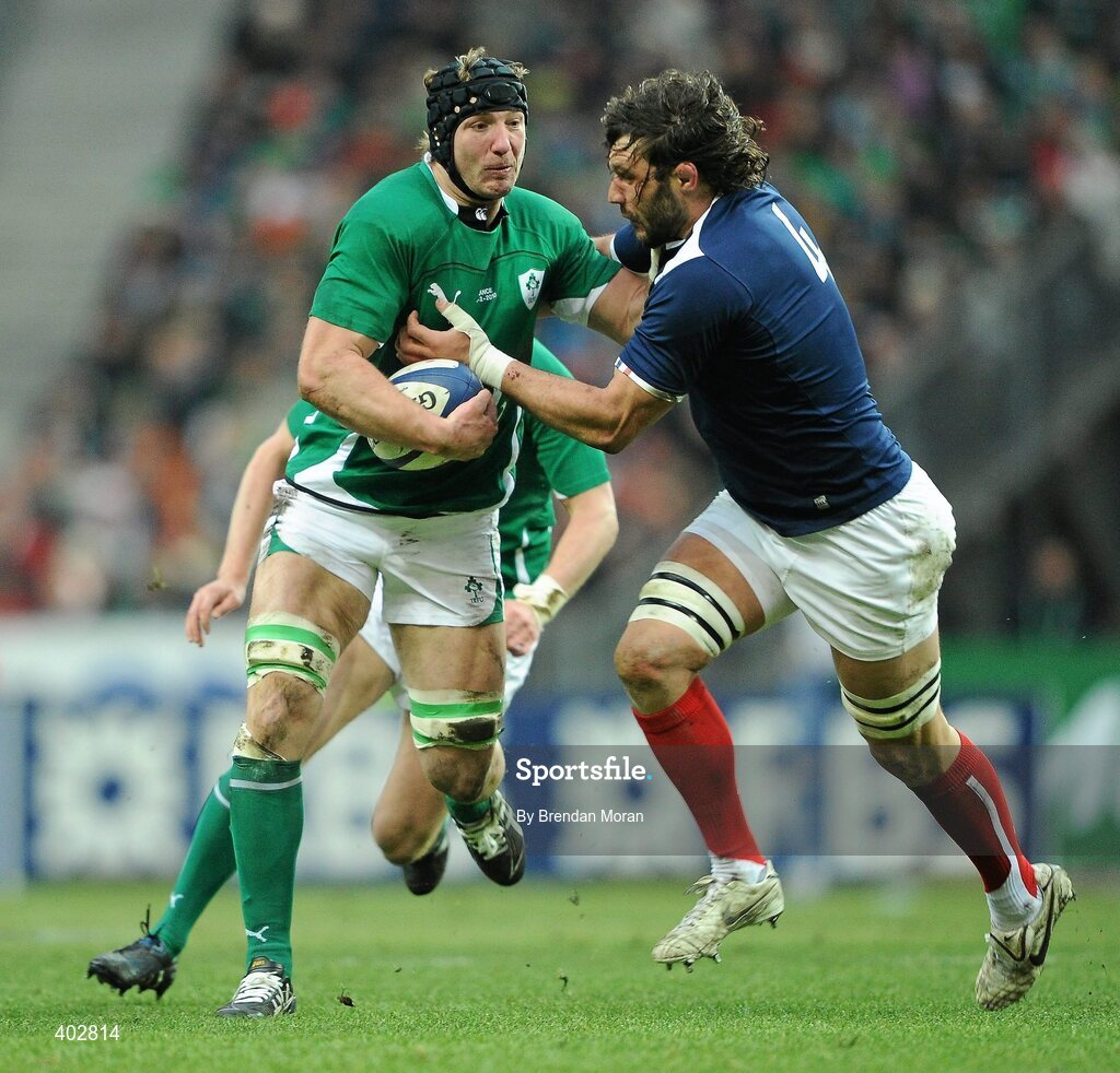 13 February 2010; Stephen Ferris, Ireland, holds off the tackle of Lionel Nallet, France. RBS Six Nations Rugby Championship, France v Ireland, Stade de France, Saint Denis, Paris, France. Picture credit: Brendan Moran / SPORTSFILE