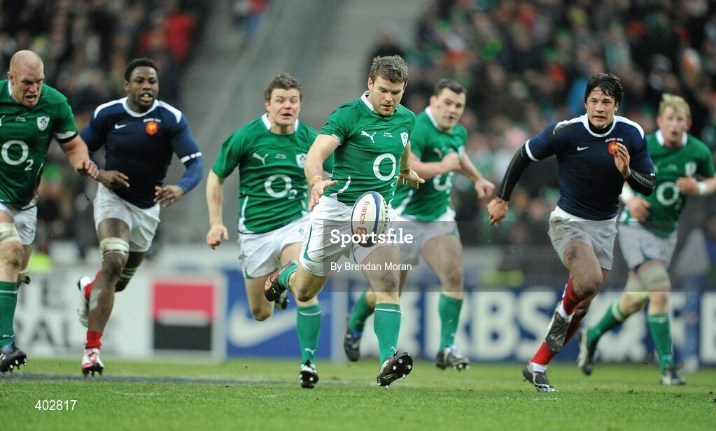 13 February 2010; Gordon D'Arcy, Ireland, supported by Paul O'Connell, Brian O'Driscoll and Cian Healy, kicks through the French defence. RBS Six Nations Rugby Championship, France v Ireland, Stade de France, Saint Denis, Paris, France. Picture credit: Brendan Moran / SPORTSFILE *** Local Caption ***