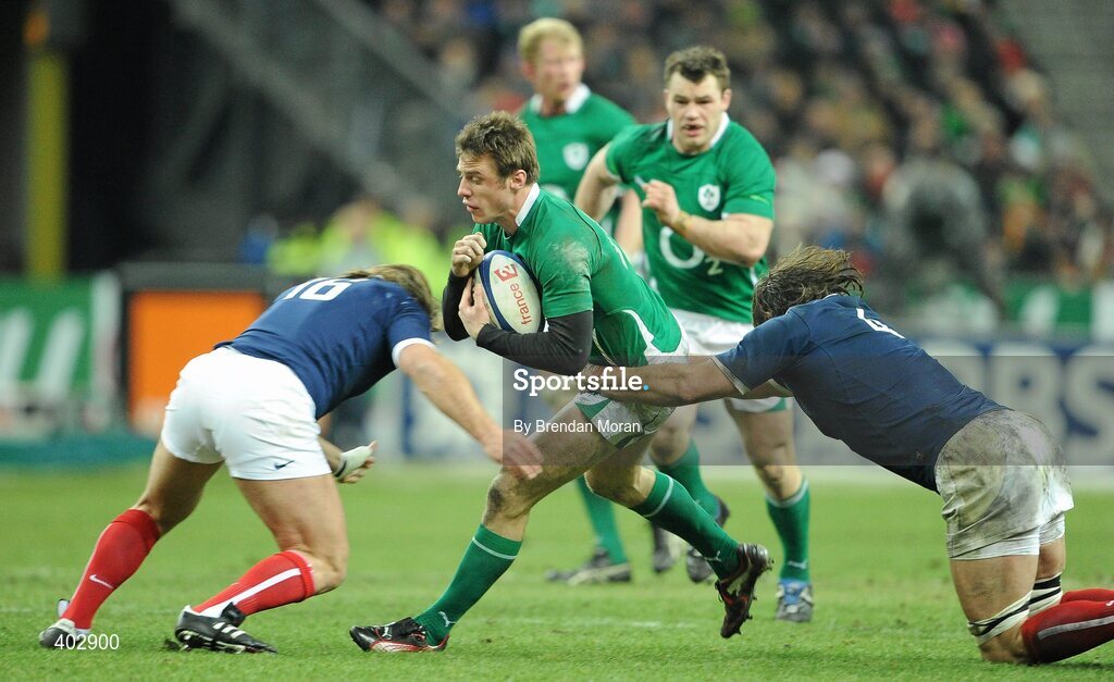 13 February 2010; Tommy Bowe, Ireland, is tackled by Dimitri Szarzewski, left, and Lionel Nallet, France. RBS Six Nations Rugby Championship, France v Ireland, Stade de France, Saint Denis, Paris, France. Picture credit: Brendan Moran / SPORTSFILE *** Local Caption ***