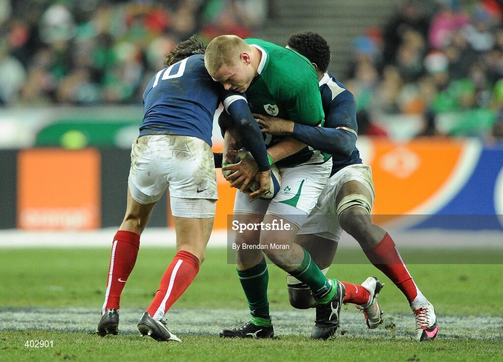 13 February 2010; Tom Court, Ireland, is tackled by Francois Trinh-Duc, left, and Fulgence Ouedraogo, France. RBS Six Nations Rugby Championship, France v Ireland, Stade de France, Saint Denis, Paris, France. Picture credit: Brendan Moran / SPORTSFILE