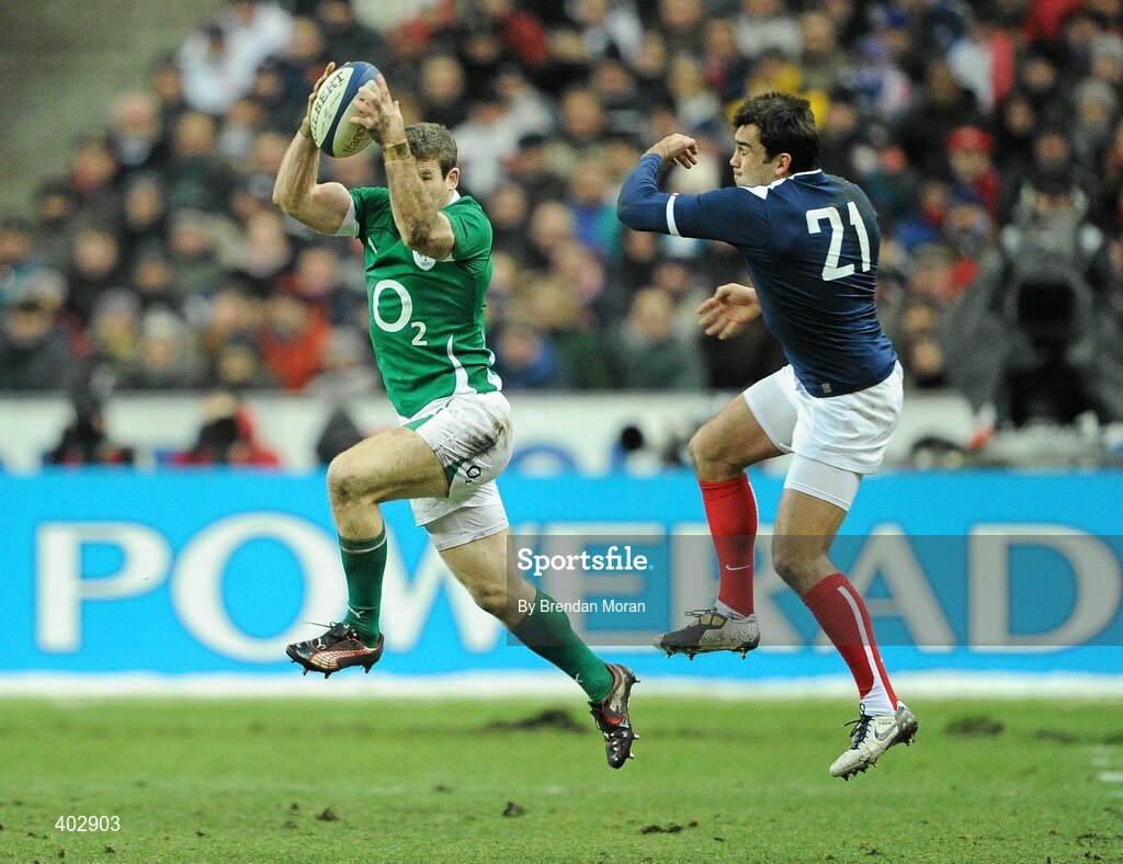 13 February 2010; Gordon D'Arcy, Ireland, catches a cross field kick ahead of David Marty, France. RBS Six Nations Rugby Championship, France v Ireland, Stade de France, Saint Denis, Paris, France. Picture credit: Brendan Moran / SPORTSFILE