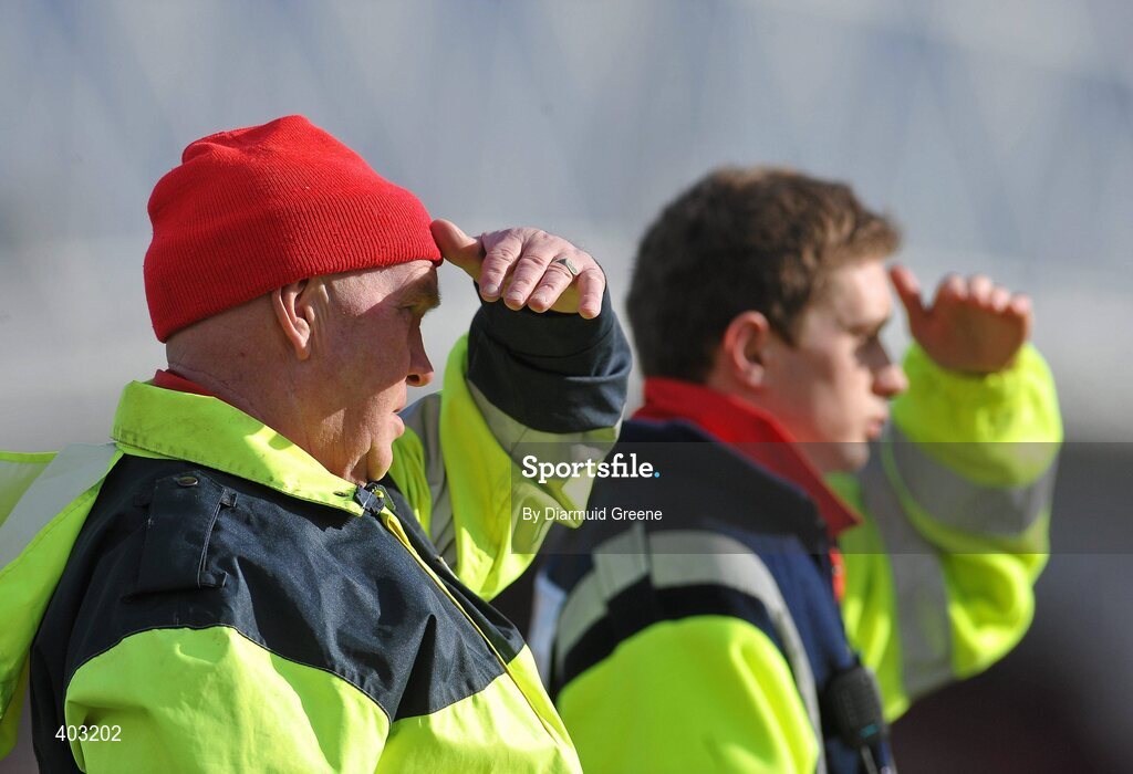 16 February 2010; Members of The Red Cross John Alymer, left, and Conor Haugh shield their eyes from the sun after an incident occurred during the game. Ulster Bank Fitzgibbon Cup Round 3, Limerick Institute of Technology v Galway Mayo Institute of Technology. Limerick IT, Limerick. Picture credit: Diarmuid Greene / SPORTSFILE