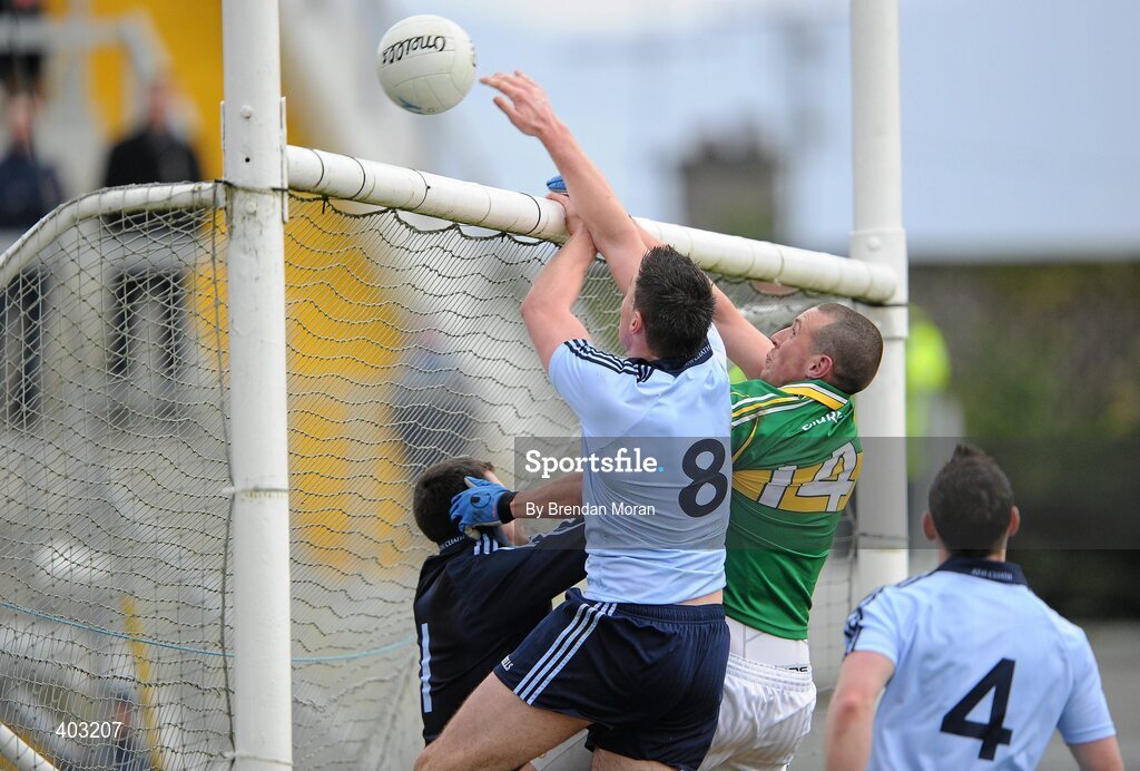7 February 2010; Kieran Donaghy, Kerry, knocks the ball over the bar for a point for his side desite the challenge of Éamon Fennell, Dublin. The point was subsequently disallowed as it was adjudged to be a square ball. Allianz GAA Football National League, Division 1, Round 1, Kerry v Dublin. Fitzgerald Stadium, Killarney. Picture credit: Brendan Moran / SPORTSFILE