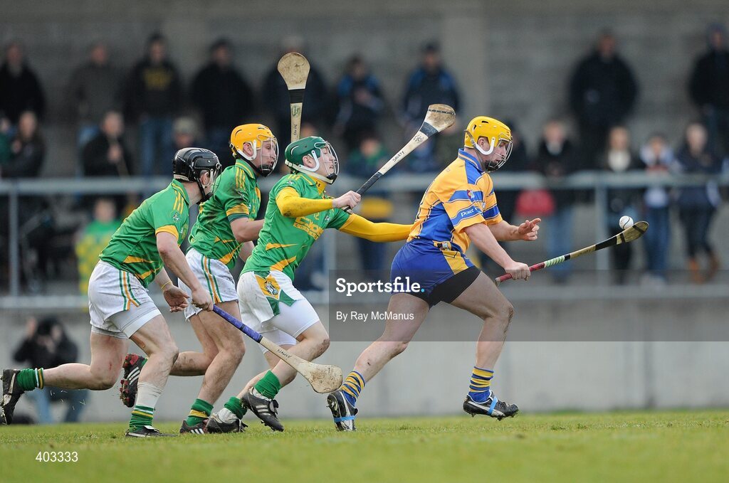 14 February 2010; Kevin Hayes, Portumna, in action against Dunloy Cuchullians players Paul Shiels,12,  Paudie Shivers, 8, and Liam Richmond. AIB GAA Hurling All-Ireland Senior Club Championship Semi-Final, Portumna v Dunloy Cuchullians, Parnell Park, Dublin. Picture credit: Ray McManus / SPORTSFILE