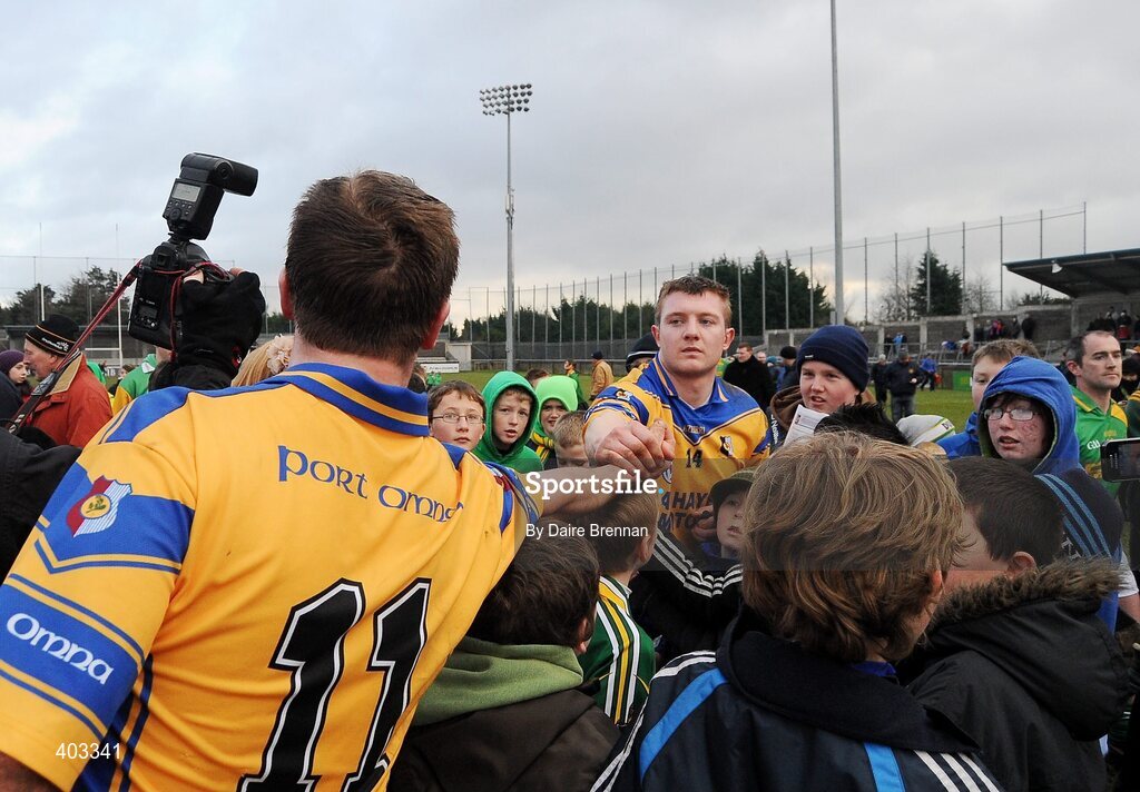 14 February 2010; Kevin Hayes, Portumna, celebrates with team-mate Joe Canning, while Joe was signing autographs after the game. AIB GAA Hurling All-Ireland Senior Club Championship Semi-Final, Portumna v Dunloy Cuchullians, Parnell Park, Dublin. Picture credit: Daire Brennan / SPORTSFILE